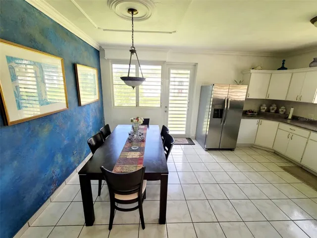 Hacienda del Dorado, Dorado, Puerto Rico property offering 4 bedrooms, 2.5 bathrooms, 2,500 sq. ft. of living space on a 3,947 sq. meter lot. Gated community with 24-hour security and excellent access to main roads in Dorado. Spacious layout with double carport for 4 vehicles and lower-level areas with plumbing and electrical ready for future conversion. Large lot provides privacy and expansion potential in a prime Dorado residential location.