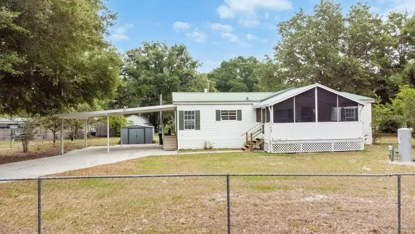 front of home with fence
