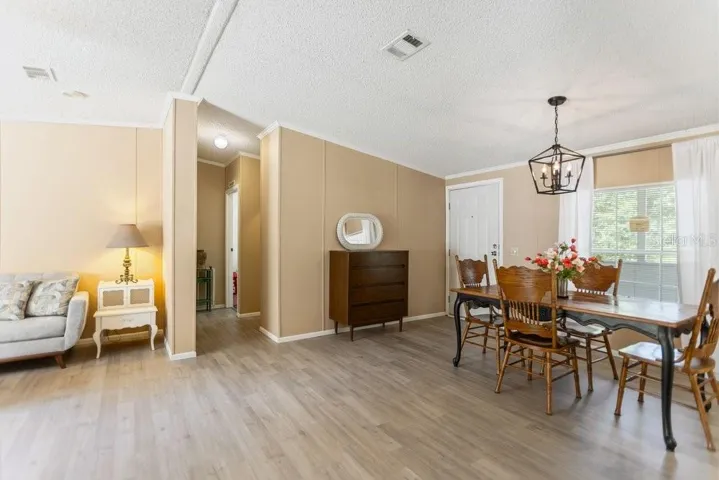 secondary bedroom hallway with full bath