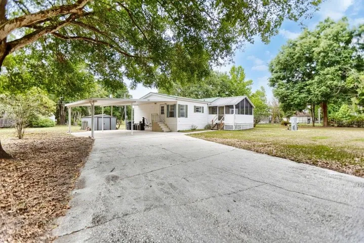 paved driveway and carport
