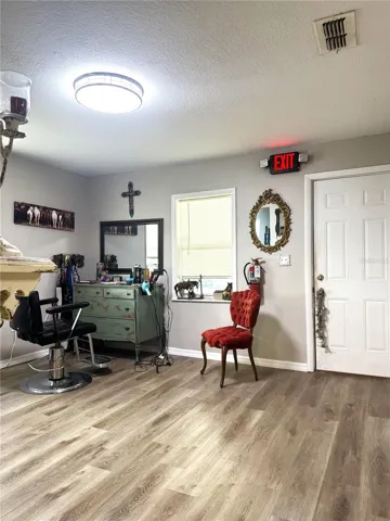 LOOKING FROM HALLWAY TO MAIN ENTRANCE UNIT "A"