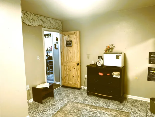 UNIT "B" MAIN BEDROOM WEST WALL & CLOSET EAST WALL & DOOR TO HALL