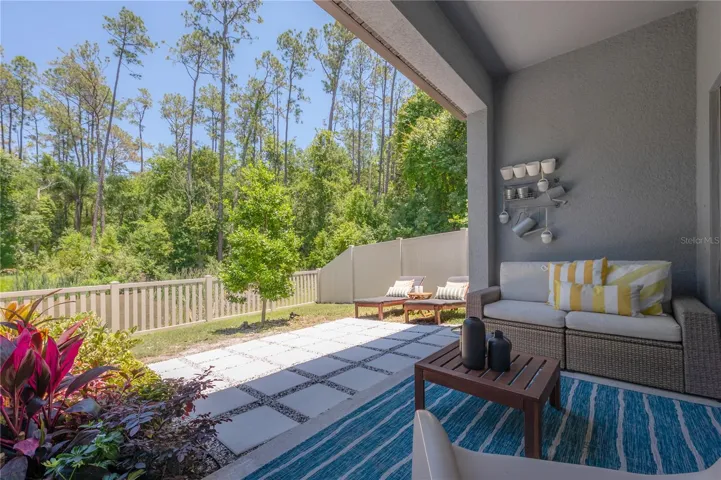 paver walkway, and serene conservation view