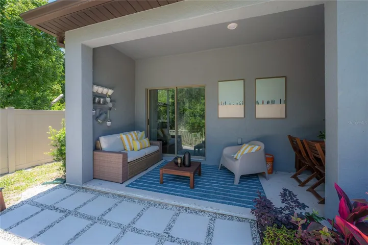 Covered patio overlooking the backyard