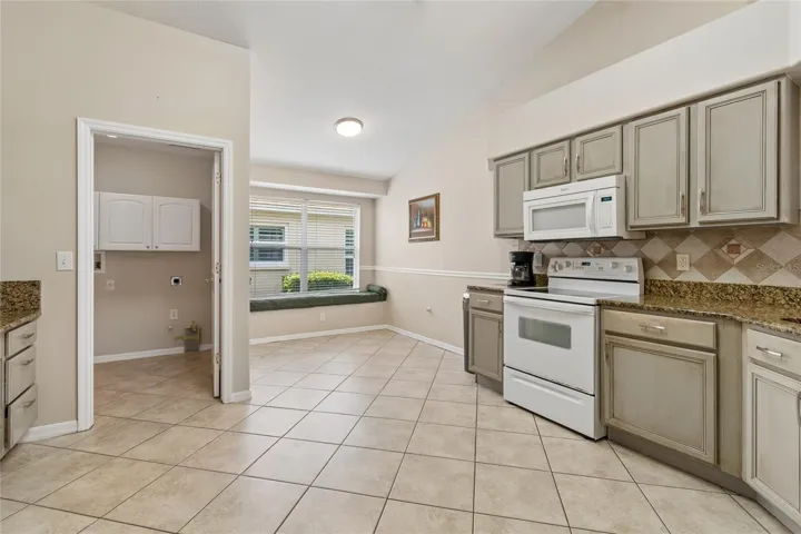 Generous Kitchen with granite counter tops!
