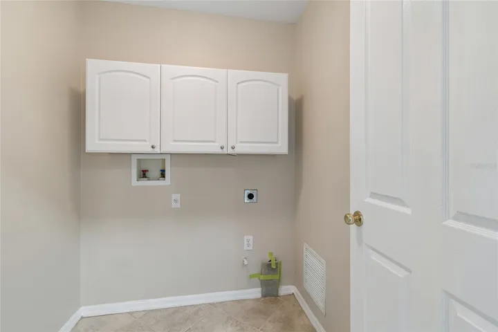 Laundry room with cabinetry