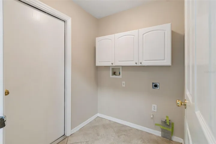 Laundry room with cabinetry
