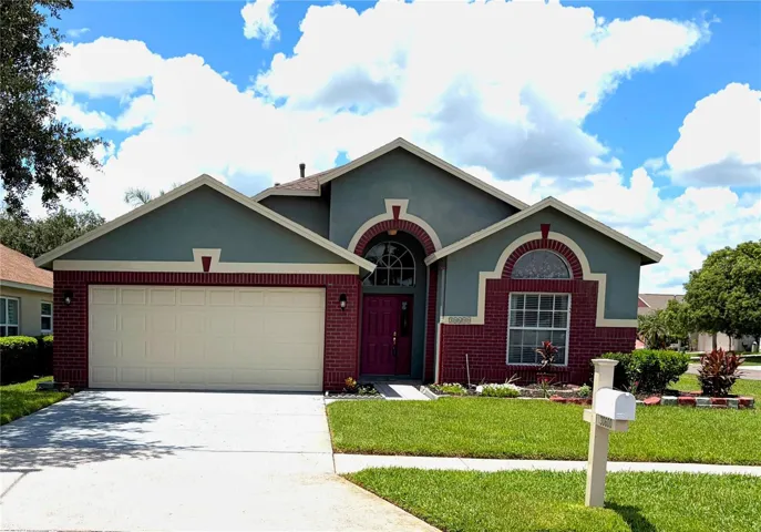 One-story , corner home with pond views!