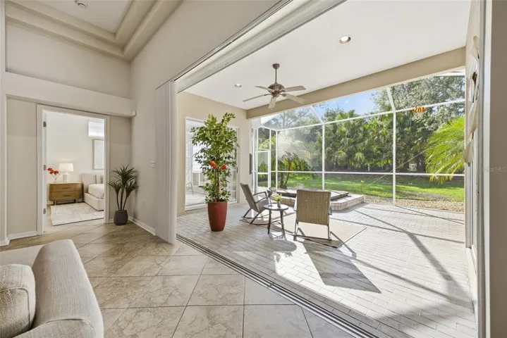 SPACIOUS BRICK SCREENED PATIO
