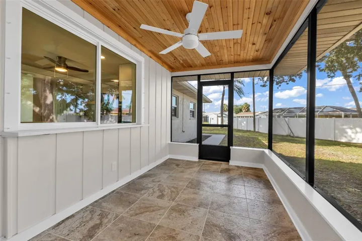 Lanai with pass-through kitchen window and bar