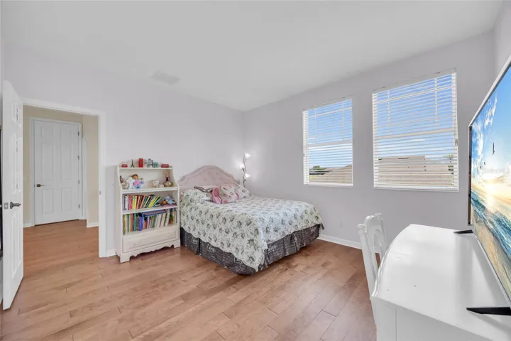 Bedroom 2 with engineered hardwood flooring