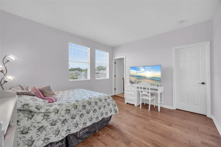 Bedroom 2 with engineered hardwood flooring