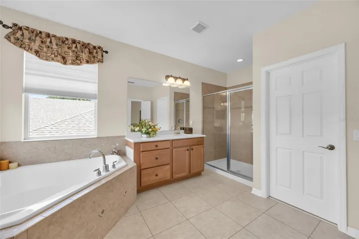 Primary bathroom with garden tub and shower