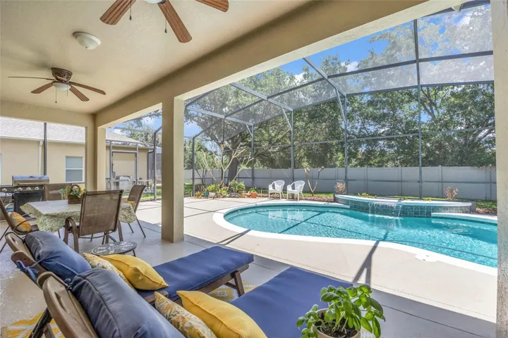 covered lanai with pool view