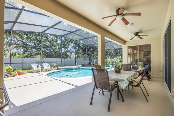 covered lanai with the pool