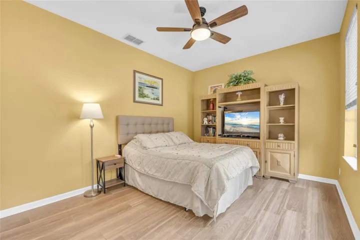 1st floor bedroom with porcelain tile flooring