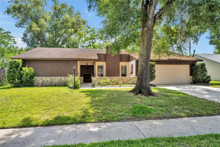 Rare 4BR home in sought after Woodside Village, zoned for Winter Park Schools and offering deeded lake access to  64-Acre Skiing and Boating Lake Pearl!