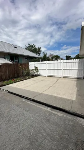Front patio area off of covered porch