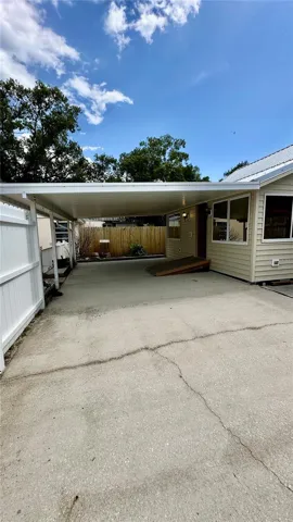 Covered front porch and side yard
