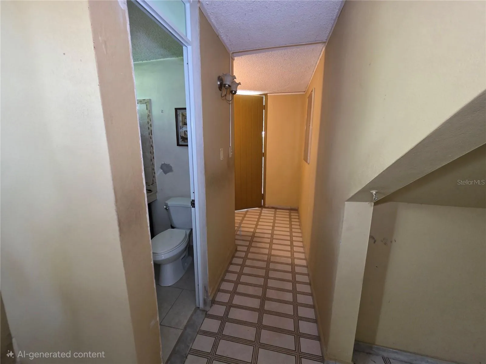 Pasillo que lleva del recibidor a la sala