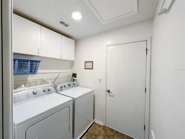 Laundry room with garage access