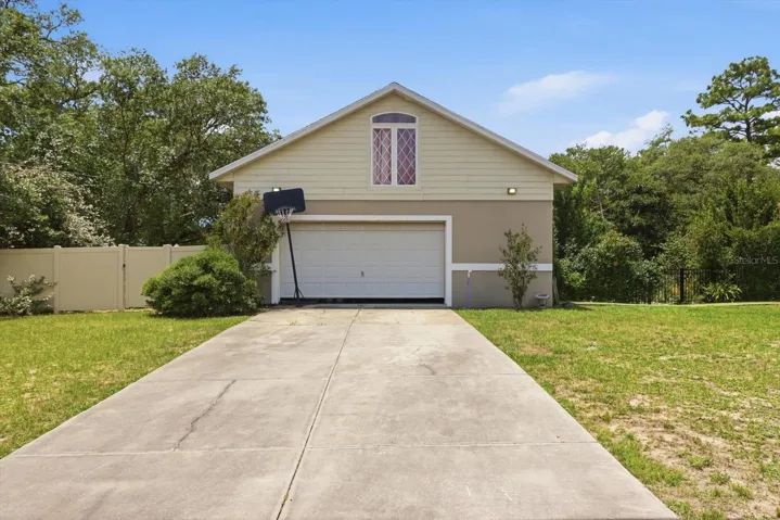 Detached garage 30x40 concrete block & stucco, with separate workshop and in law suite on the 2nd floor