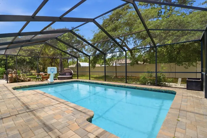 Screened in pool & pavered lanai