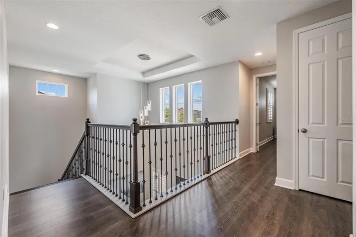 Second floor landing with designer railing