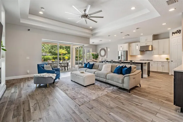 Open and airy great room with backyard views