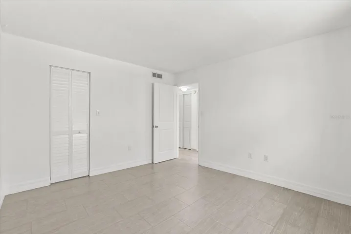 Primary bedroom and walk-in closet