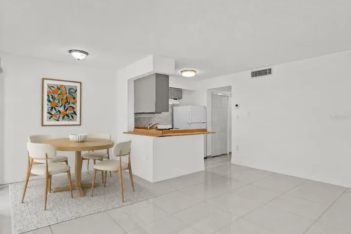 Reality Staged dinette; kitchen with open space