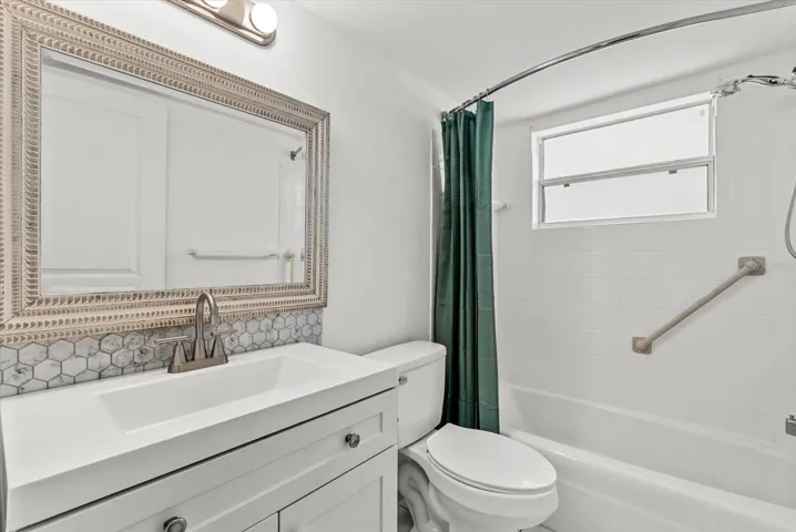 Clean bathroom with updated vanity
