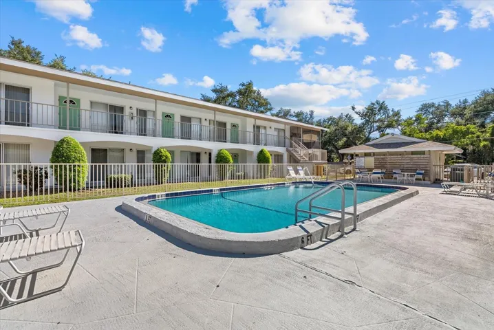 Large community pool with cabana baths