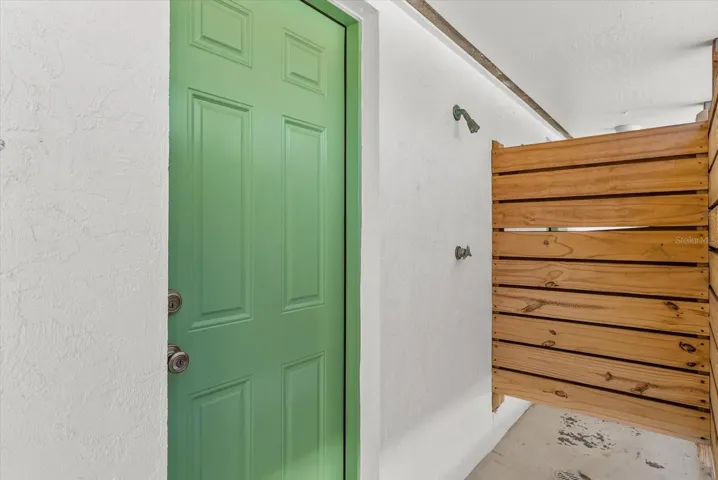 Outdoor shower to rinse off after exiting pool