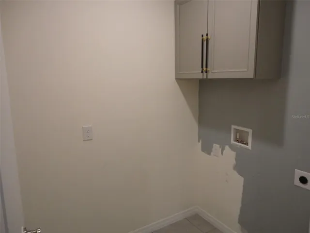 Indoor Laundry Room with electric washer/dryer hook-up