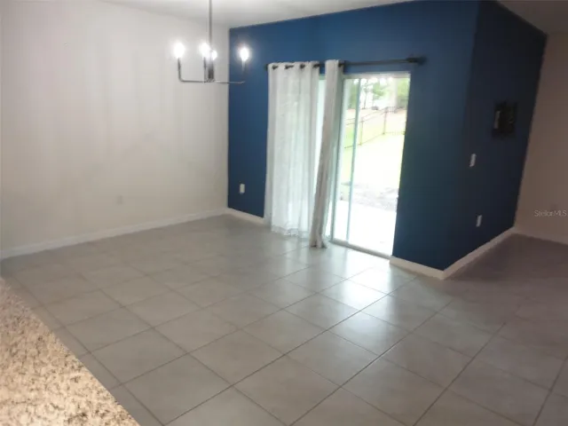 Dining/Living Area to Covered Back Patio