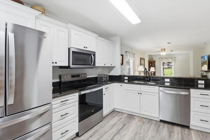 New Updated Kitchen w/ White Cabinets, Granite Countertops & Stainless-Steel Appliances