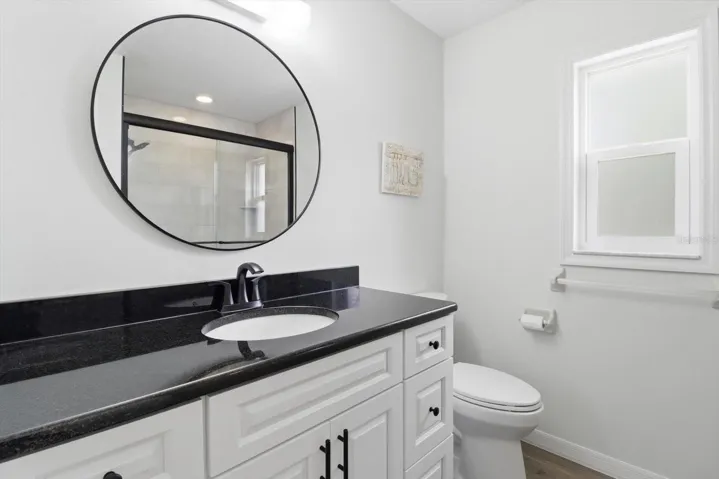 Updated Master Bathroom w/ NEW White Vanity, NEW Granite Top & NEW Faucet