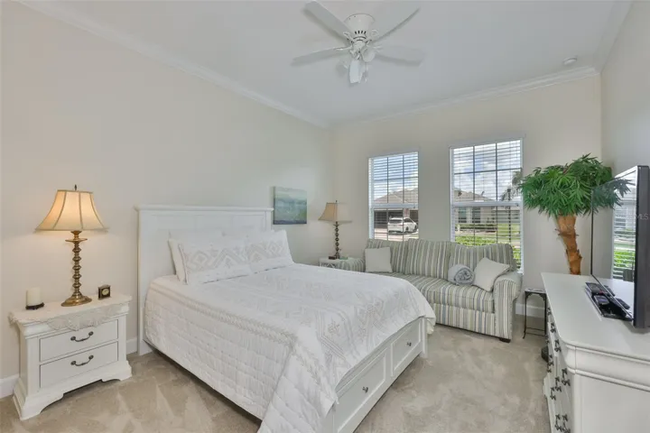 Bedroom #2 boasts large windows and has a wonderfully spacious feel.  The carpet is new and was added as a luxury item.