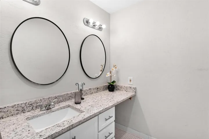 Suite 2 Bath...remodeled with granite countertops.