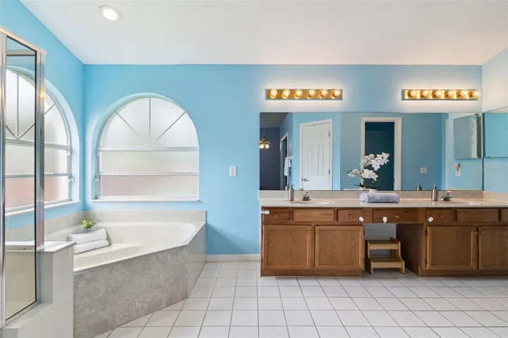 Spa-like luxury at home. The primary ensuite bathroom comes fully equipped with dual sinks, a separate walk-in shower, and a relaxing garden tub.