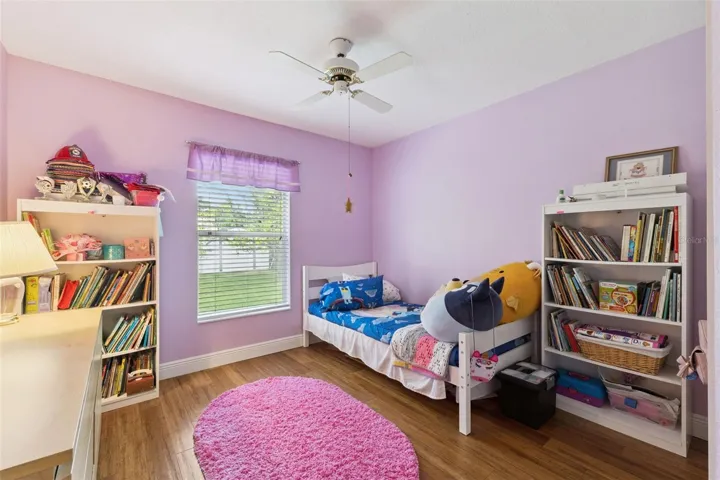 Perfect for a growing family or multi-generational living, Bedroom 3 is positioned next to the secondary full bath and offers views of the fenced yard.