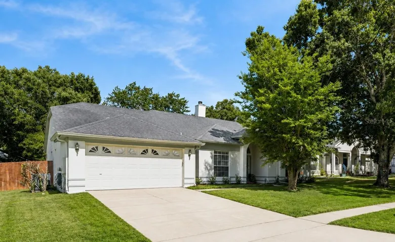 Welcome to 3883 Kingston Oaks Cove, a beautifully maintained 4-bedroom Oviedo home nestled on a quiet cul-de-sac in a charming 26-home community that feels tucked away, yet close to everything.