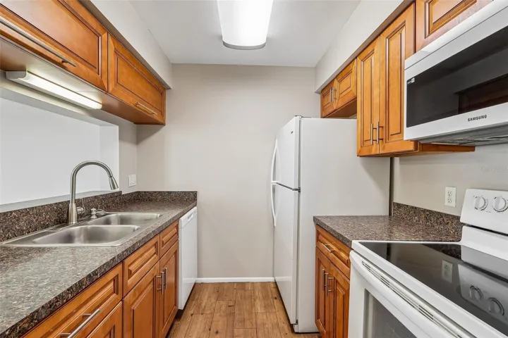 Upgraded cabinetry anchors the well equipped kitchen.