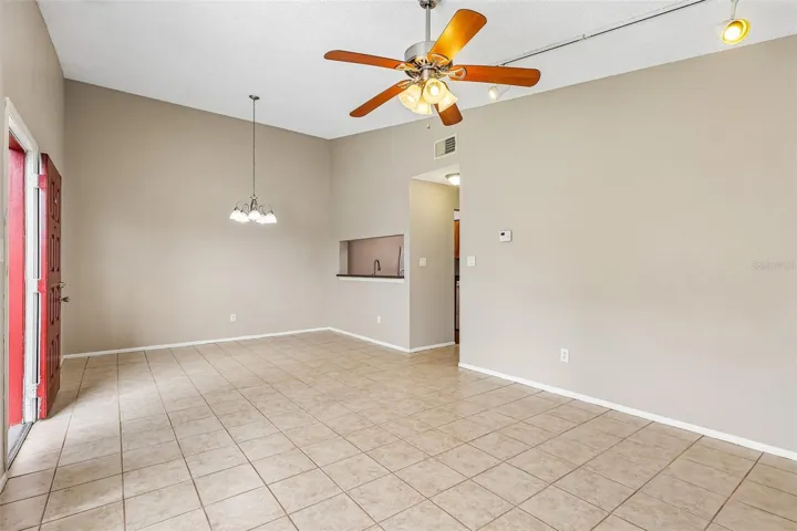 The vaulted ceilings add to the light and bright feel of the open living and dining areas.