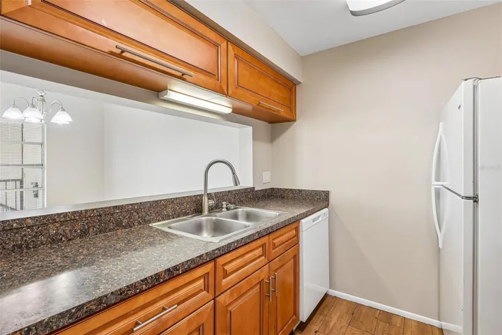 Stay connected to the dining space through the breakfast bar/passthrough.