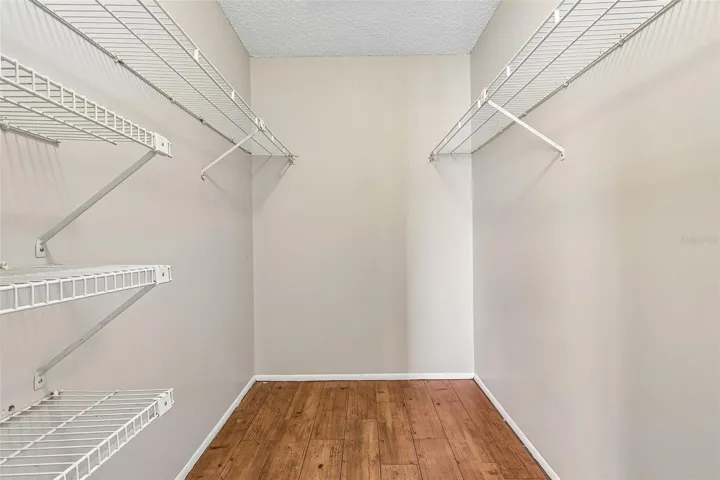 Primary suite features a walk-in closet.