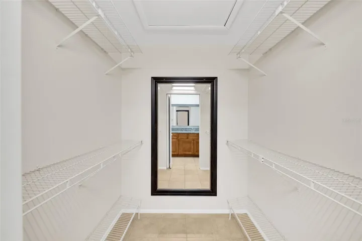 Primary Bedroom walk in closet