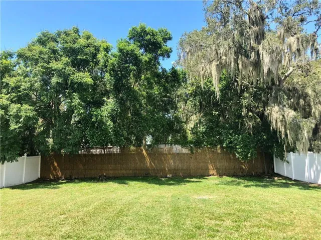 One of the largest yard in the community and close to the gated entrance