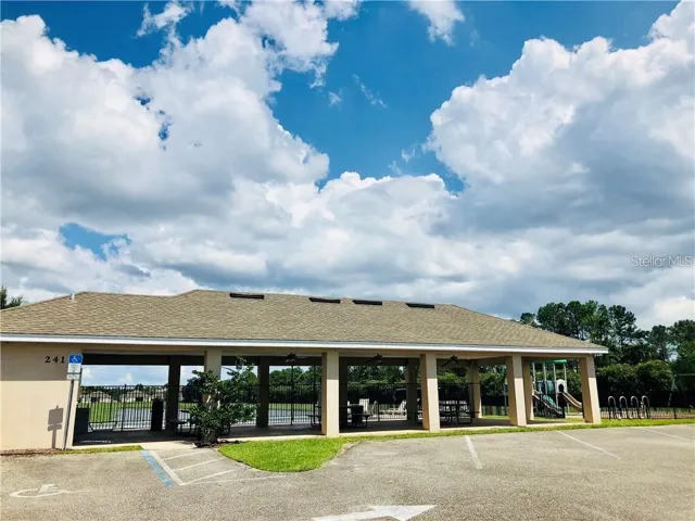 Covered picnic area with plenty of picnic tables for your outing with restrooms